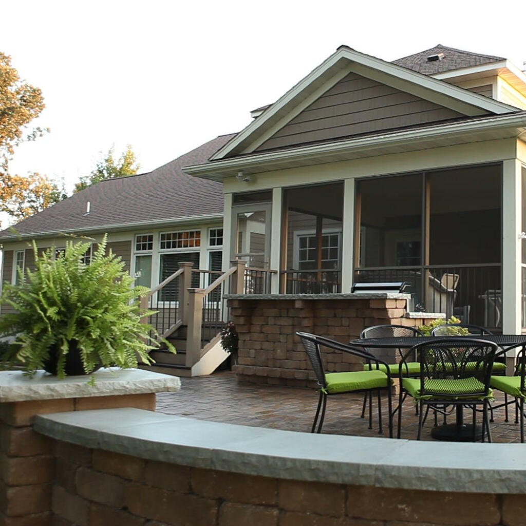 entertaining in your backyard with patio, fireplace, retaining wall