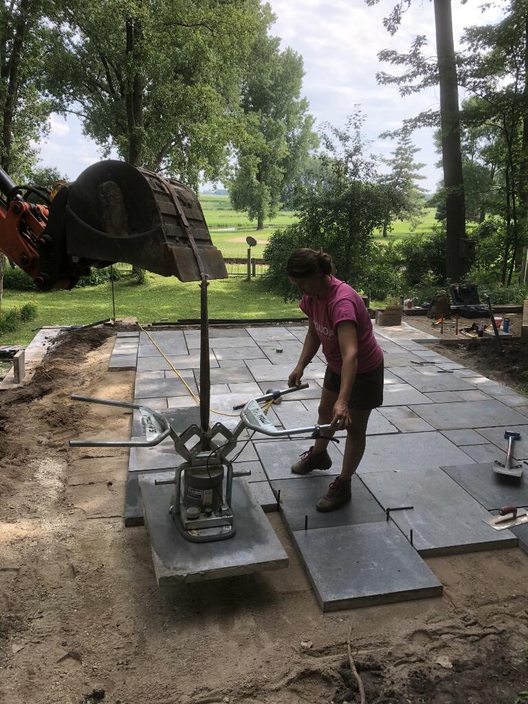 Vacuum Paver Installation for backyard patio by Sequoia Landscape