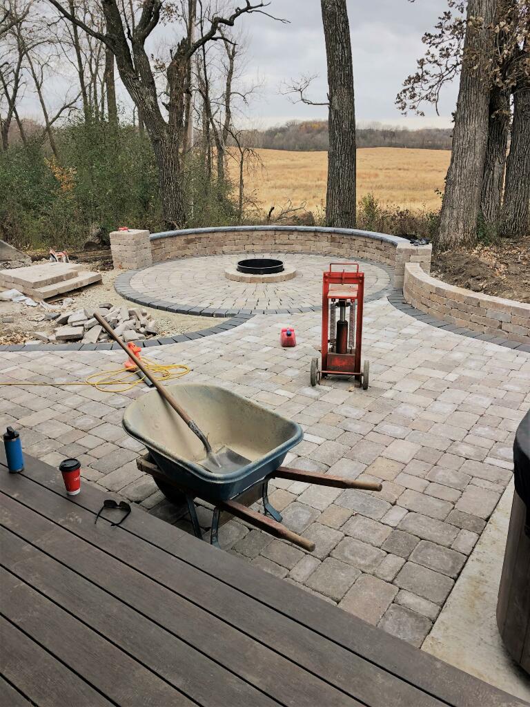 Working on Firepit with Sitwall Seating area by Sequoia Landscape