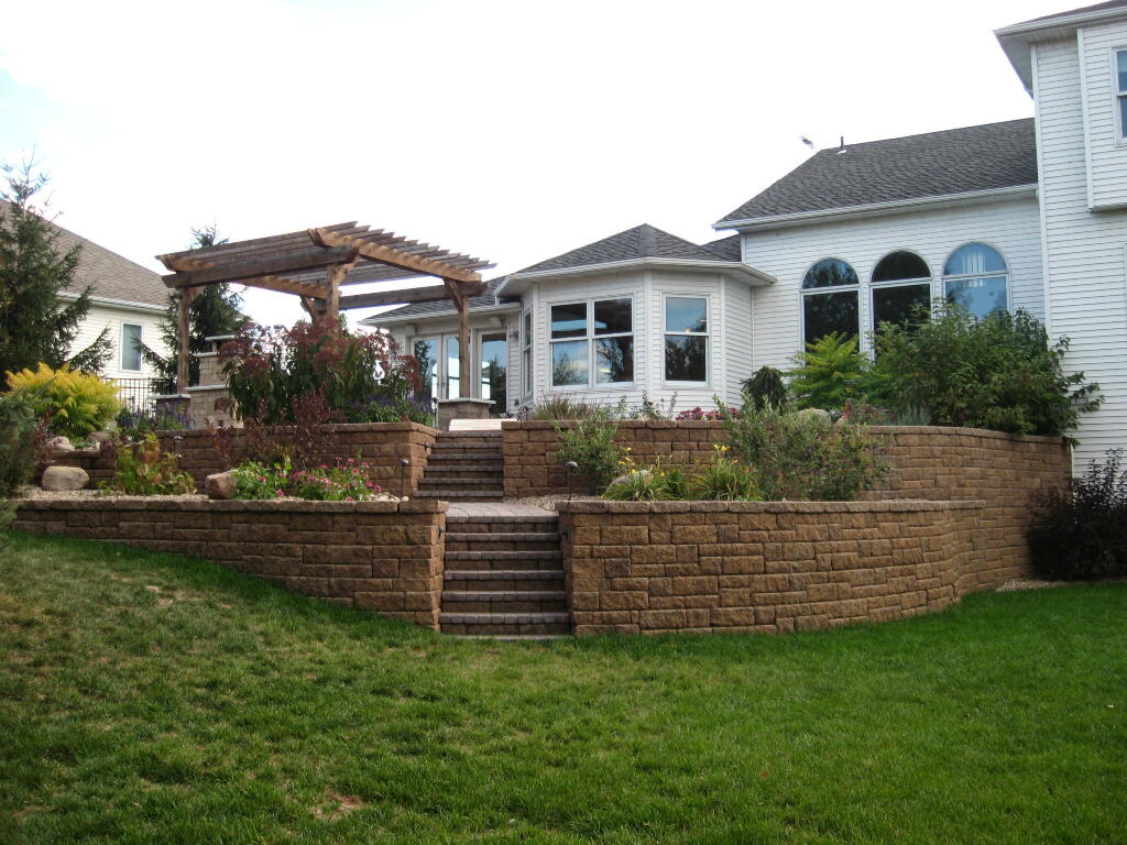 Tiered Mosaic Retaining Wall with Steps by Sequoia Landscape