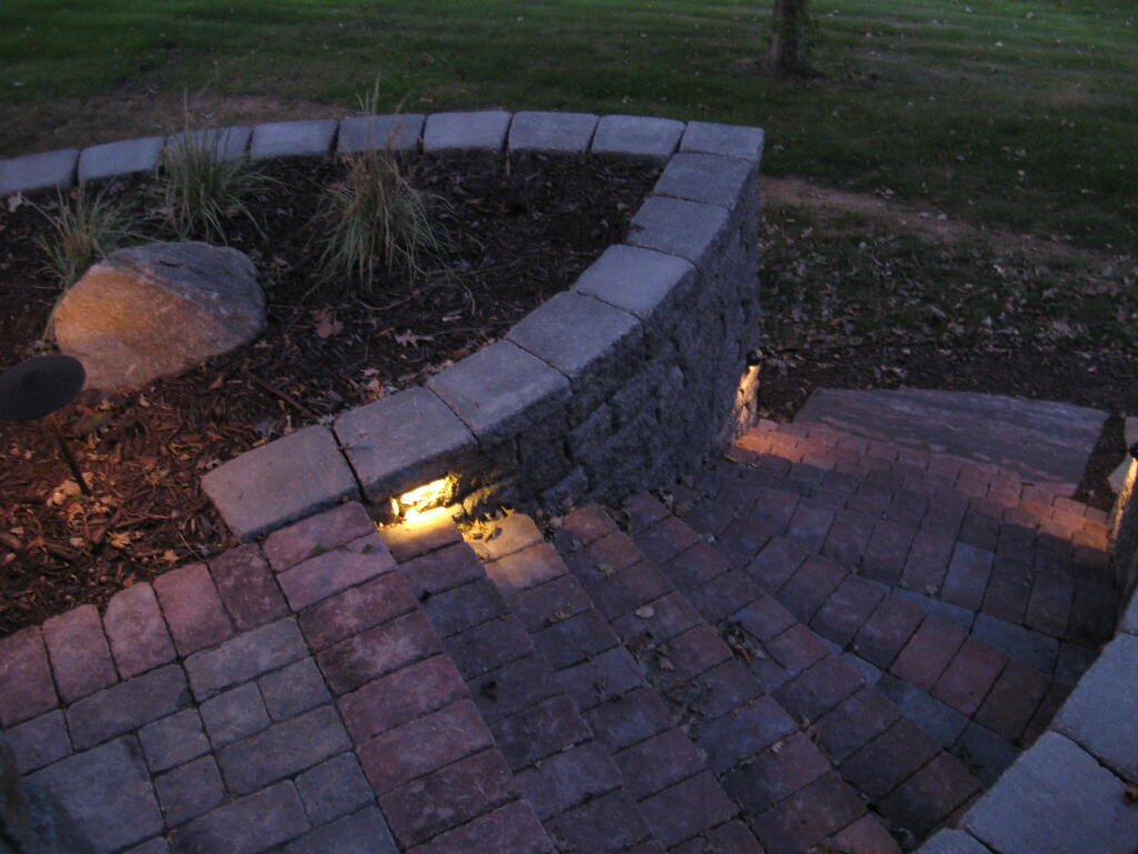 Steps at Night | Patio and retaining wall with plantings by Sequoia Landscape