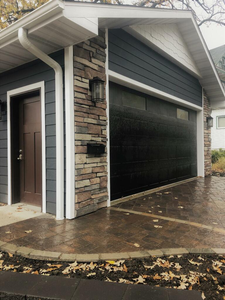 Permeable Pavers Connecting Driveway to Garage Side Door by Sequoia Landscape